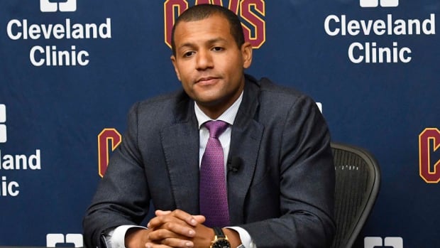 Cleveland Cavaliers general manager Koby Altman listens to a reporter's question during a press conference.